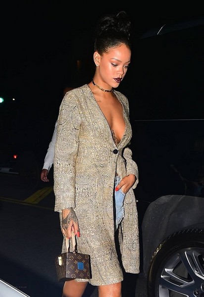 Rihanna exposes her Egyptian goddess tattoo as she goes braless in LA